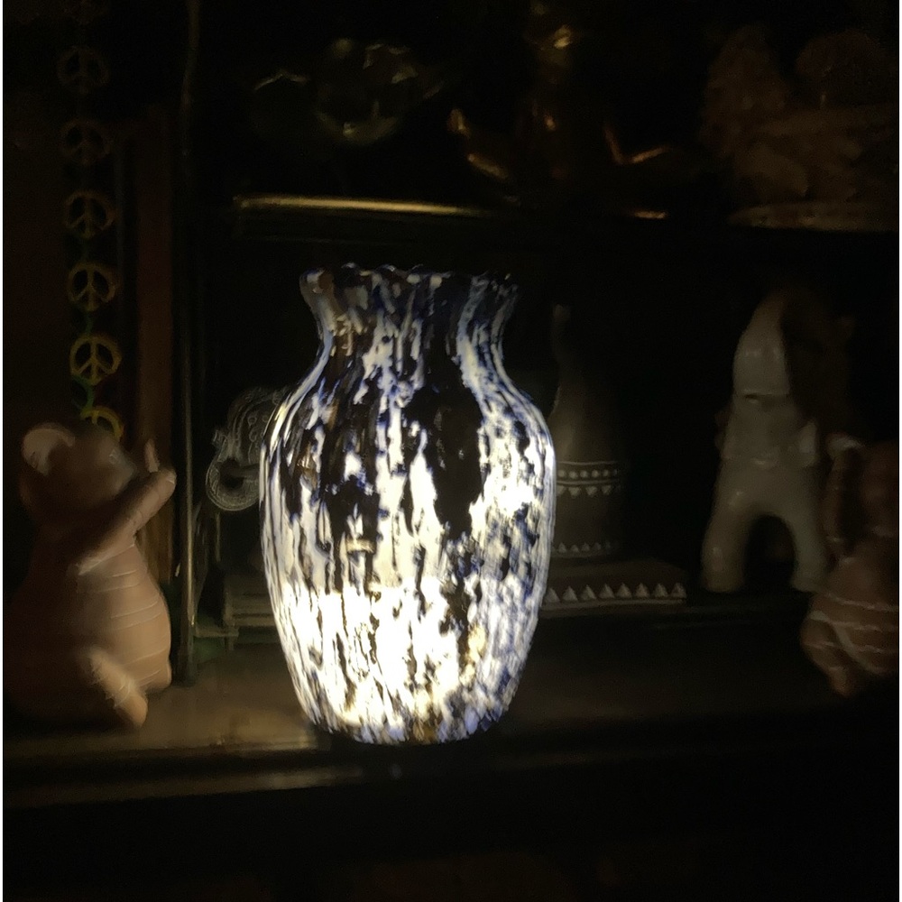 Glass vace with white and blue colored epoxy